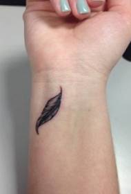 Girl wrist on black gray sketch point thorn skill creative literary leaf tattoo picture