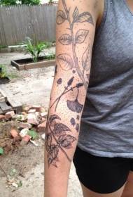 女孩手臂咬樹葉植物紋身圖案