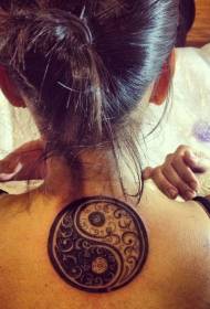 Female back black and white yin and yang gossip tattoo pattern