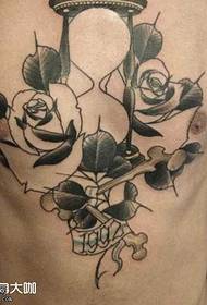 Chest rose tattoo