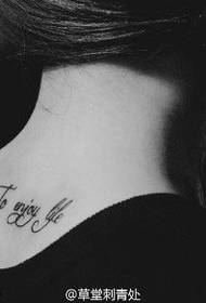 Simple English tattoo on the back