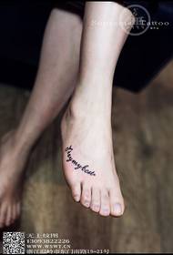 Refreshing text tattoo on the instep