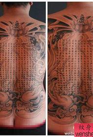 Um padrão popular popular de tatuagem em sânscrito nas costas