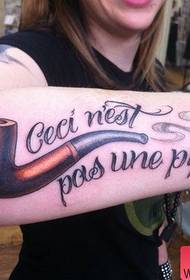 Arm pipe letter tattoo