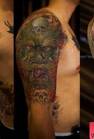 braccio maschile Prepotente raffreddare un disegno del tatuaggio del drago