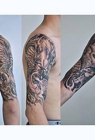 modello tatuaggio drago braccio grande