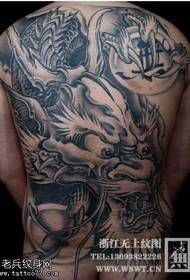 modello tatuaggio drago nero grigio schiena piena