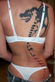 女生背部龙骨架黑色纹身图案