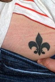 liljamitalin symboli vatsa musta tatuointi malli