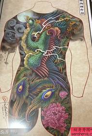 havalı, sırtı renkli bir anka kuşu dövme el yazması