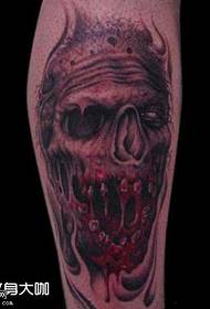 exemplar cruribus caro skull tattoo