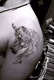 skouder unicorn tattoo patroan