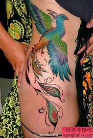 fantasia laterale in vita a motivo tatuaggio fenice color caviglia