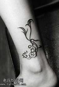 perna tótem fermoso patrón de tatuaxe fénix