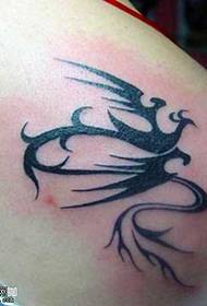 modello tatuaggio totem spalla fenice