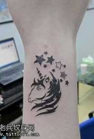 braccio bellissimo modello tatuaggio totem unicorno