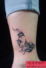 intombazana iyathanda umlenze we-tattoo totem phoenix tattoo