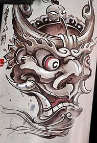 татуировка с изображением китайского ветра