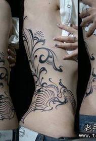 female A totem phoenix tattoo pattern from the waist to the back of the child