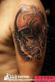 brachium masculus a classic exemplum frigus skull tattoo