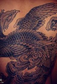 „Phoenix“ tatuiruotės raštas užpakalinėje atmosferoje