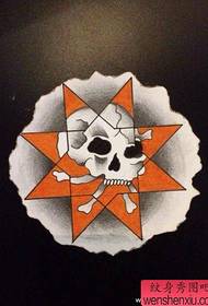 a small and stylish skull tattoo manuscript