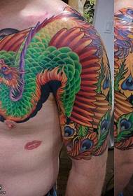 painted phoenix tattoo pattern on the shoulder