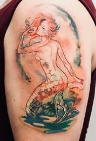 um grupo de fotos de tatuagem de sereia