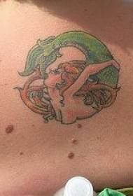 dath muineál mermaid ag ithe patrún tattoo eireaball
