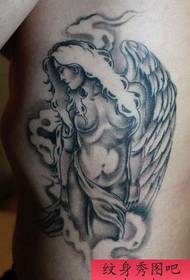 šoninis juosmuo su juodos pilkos spalvos angelo sparnų tatuiruotės modeliu