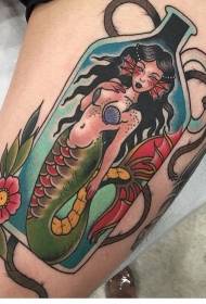 foto tatuaggio gamba sirena vecchia scuola a colori