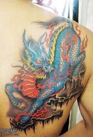 model de tatuaj albastru unicorn din spate