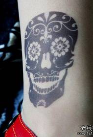 girl's leg beautiful totem tattoo pattern