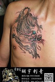 tatuaggio unicorno spalla posteriore