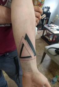 boys arm on black geometric simple line triangle tattoo picture