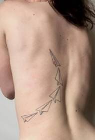 女孩的幾何簡單線條紙飛機紋身圖片背面的黑刺