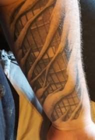 O braço do menino sobre o desenho cinza preto criativo imagem de tatuagem dominadora rachada