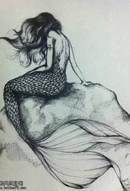 cov lus sau mermaid rov qab tattoo tsim