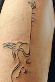 Boys arm on black abstract line notes and guitar tattoo pictures