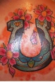 спінка колеру падковы і малюнак татуіроўкі кветак персіка