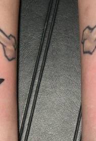 teschio con motivo tatuaggio stelle bianche e nere