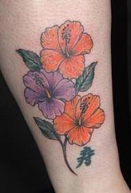leg Purple and orange flower hibiscus tattoo