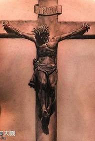 тату крест на спине Иисус