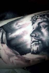 Liels melns Jēzus portreta tetovējuma raksts