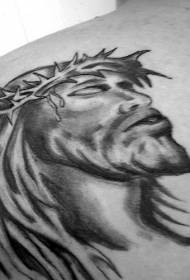 ikledd en torn av Jesus svart tatoveringsmønster
