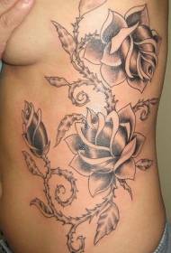 sy-geribde tam-patroon met rose-swart tatoeëring