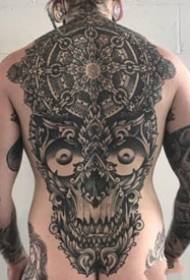 a group of large-scale black totem prick tattoo works