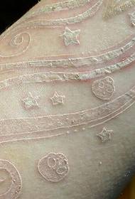 tatuaggio pentagramma inchiostro bianco