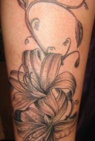 minimalista liliom és szőlő fekete kőris tetoválásmintázat