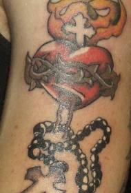 earkleurige Sacred Heart en Rose tatoeëringsfoto